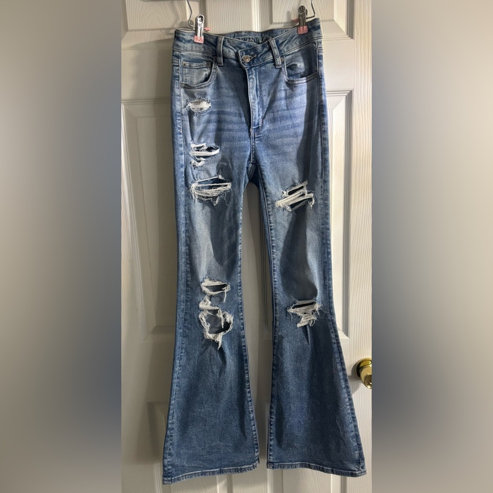 American Eagle Outfitters Super Hi-Rise Distressed Flare Jeans